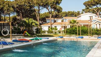 Seasonal outdoor pool, pool umbrellas, pool loungers