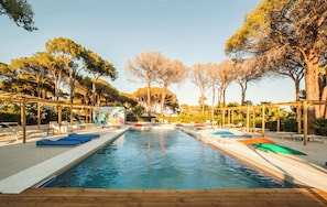 Seasonal outdoor pool, pool umbrellas, pool loungers