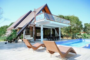 Unclassified image, 5 of 30, button - Step into an A-Frame home, where white tropical design meets ultimate comfort. (Bolinao)