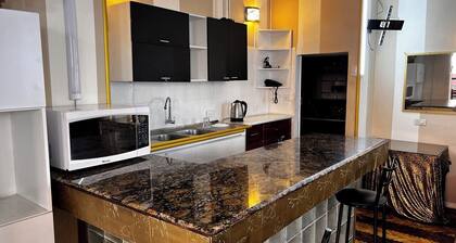 Lodging in the center with gym and parking included.