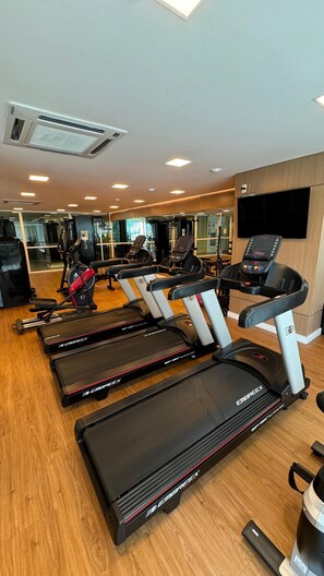 Stay active and focused in our well-equipped gym, featuring state-of-the-art treadmills and a range of exercise equipment.