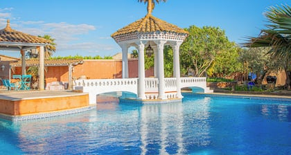 Luxury studio-style room across from the pool with a private terrace