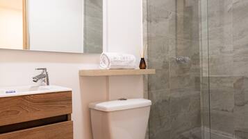 Hair dryer, towels, soap, shampoo