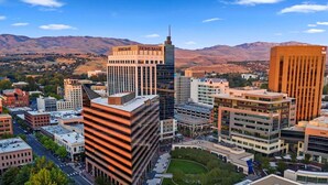 A cityscape with modern buildings, including a bank and a hotel. - Cozy Boise Stay: Central Spot (Boise)