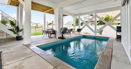 Experience luxury at Steel N Suns, a spacious 6bd 6ba Elevator, Heated Pool & Dock