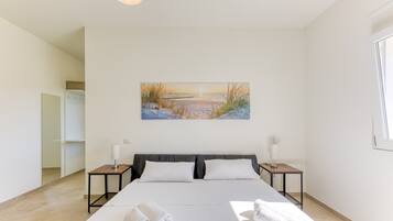 2 slaapkamers, een strijkplank/strijkijzer, gratis wifi, beddengoed