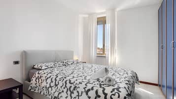 2 dormitorios, tabla de planchar con plancha, wifi gratis y ropa de cama