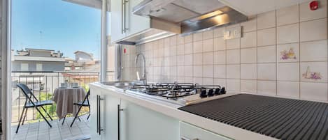 Fridge, microwave, stovetop, high chair