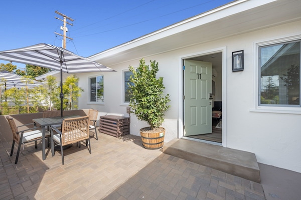 Experience your semi-private patio, featuring a table and four chairs, and ideal for basking in the sun while enjoying your morning coffee.