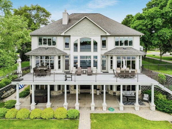 Outdoor dining - Downtown Lakefront Home on Lake Chetek w/hot tub & pontoon & jet ski rental (Chetek)