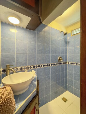 Shower, hair dryer, towels, soap