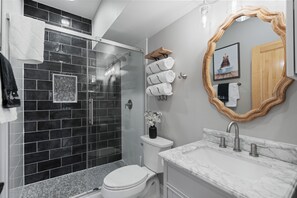 Shower, towels, soap, shampoo