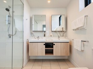 Shower, hair dryer, towels, soap