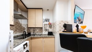 Fridge, microwave, coffee/tea maker, electric kettle