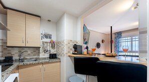 Fridge, microwave, coffee/tea maker, electric kettle