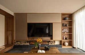 Comfort Villa, 4 Bedrooms | Living room | 100-inch TV with digital channels, books, heated floors - Hegu Mountain Retreat (Chengdu)
