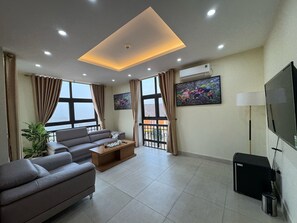 Habitación doble superior | Zona de estar