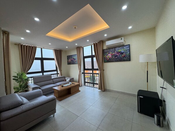 Chambre Double Supérieure | Coin séjour