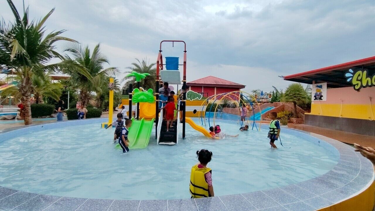 A water park with slides and play structures.