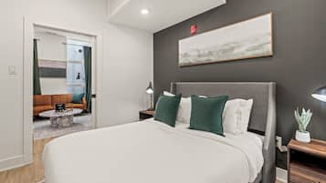 1 bedroom, desk, iron/ironing board, travel crib