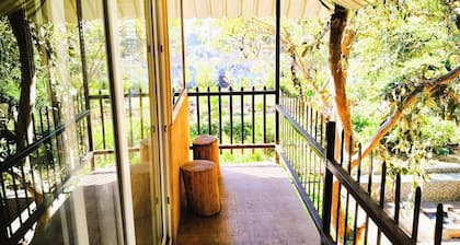 Experience Nature’s Charm: Unique Treehouse Stay by a Scenic Lake!