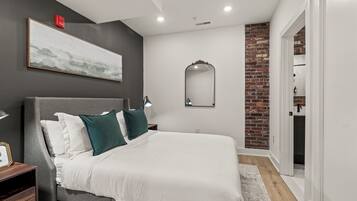 1 bedroom, desk, iron/ironing board, travel crib