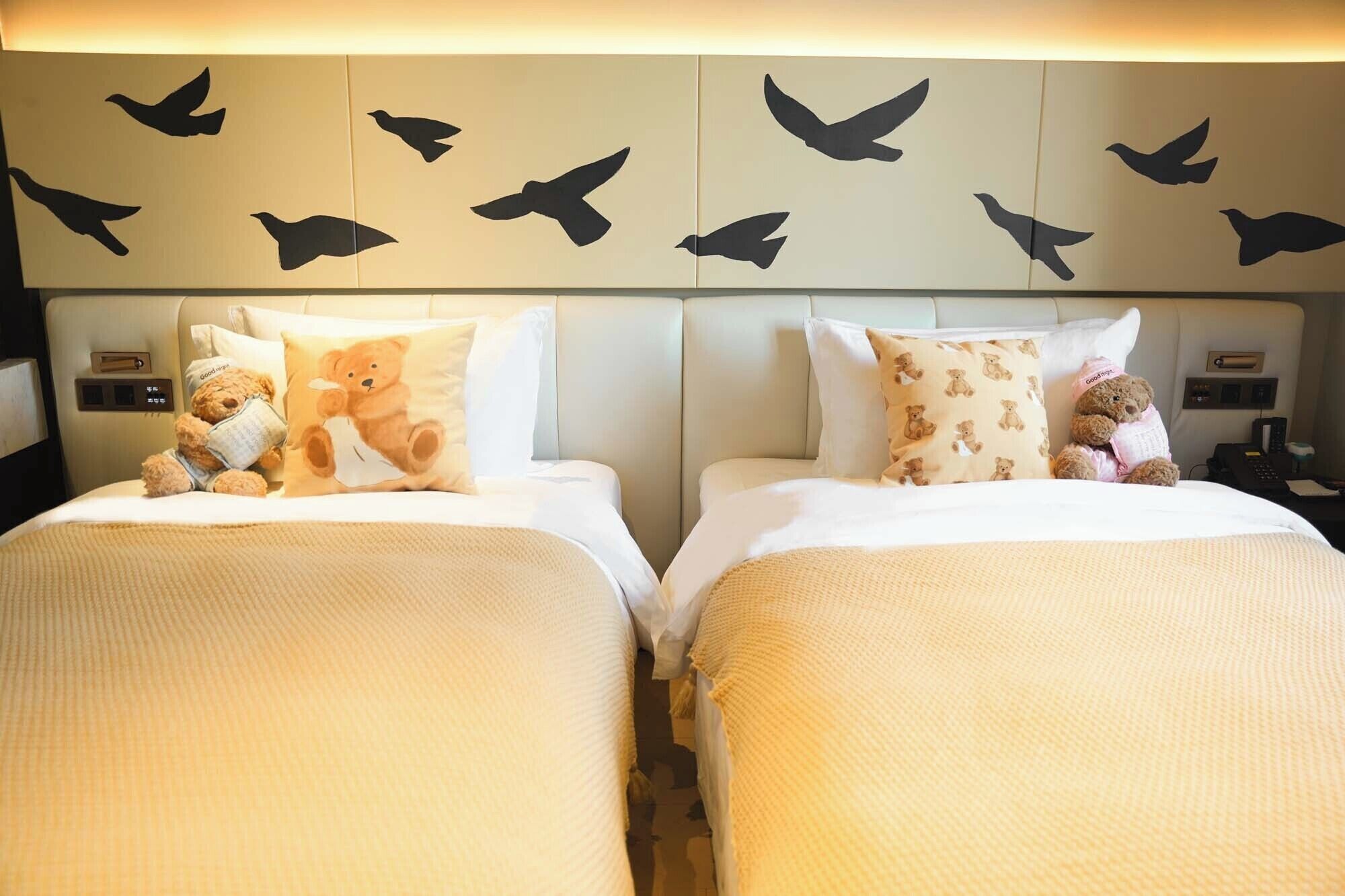 FamilieTwin kamer | Luxe beddengoed, een minibar, individueel gedecoreerd