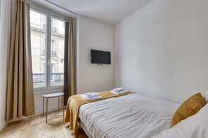 1 slaapkamer, een strijkplank/strijkijzer, reisbedje, wifi