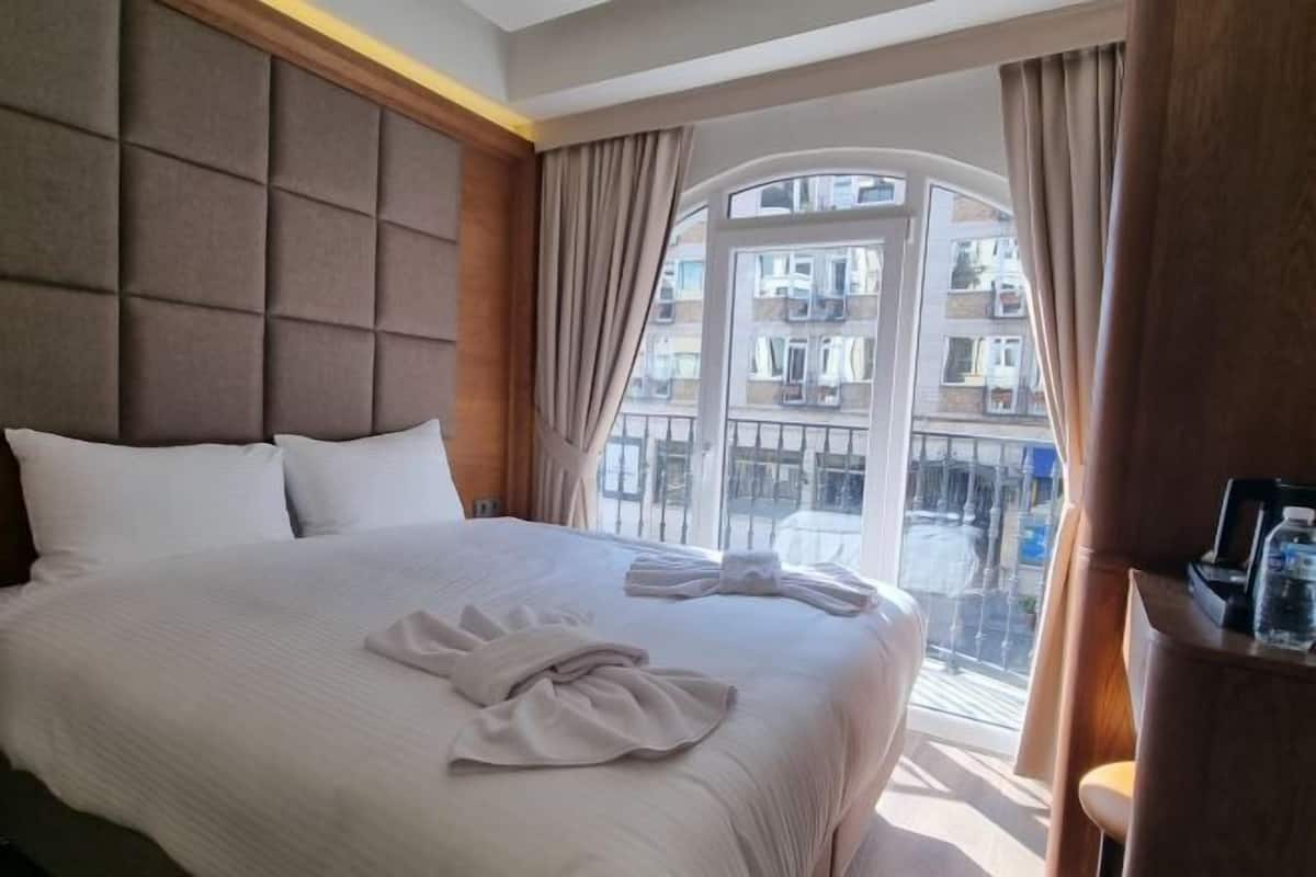 Biancheria da letto di alta qualità, minibar, cassaforte in camera
