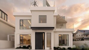A modern two-story house with large windows, a prominent black door, and a minimalist design. - La Felicità (Shenzhen)