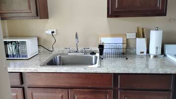Fridge, microwave, coffee/tea maker, toaster