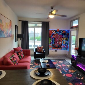 TV, fireplace, books