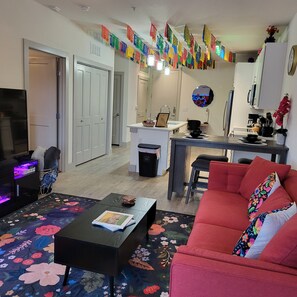 TV, fireplace, books