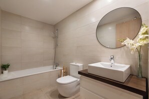 Hair dryer, bidet, towels, soap