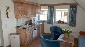Fridge, stovetop, coffee/tea maker, electric kettle