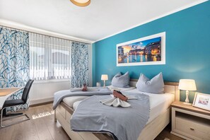 1 slaapkamer, een strijkplank/strijkijzer, gratis wifi, beddengoed