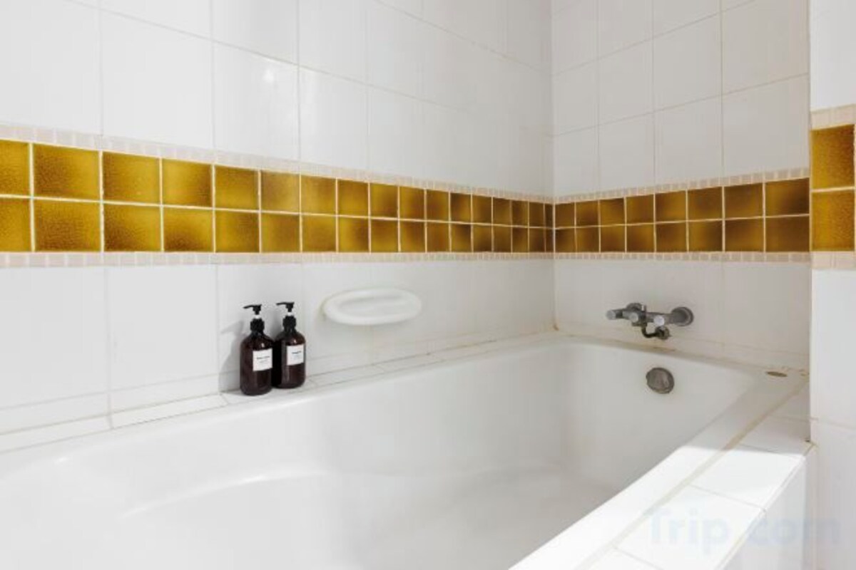 Shower, slippers, bidet, towels