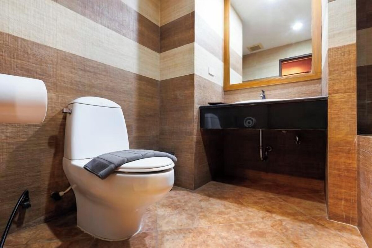 Shower, slippers, bidet, towels