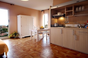 Fridge, microwave, stovetop, high chair