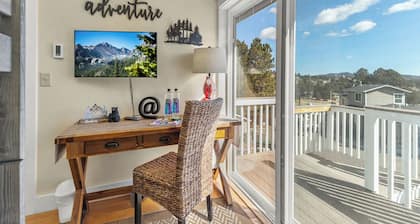 Hot Tub • Fire Pit • Walk to Downtown Estes & Stanley Hotel • Historic Renovated 1928 Cottage