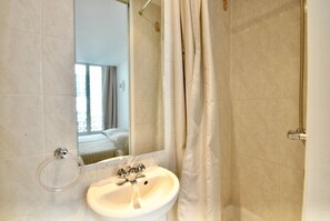 Regadera y secadora de cabello 