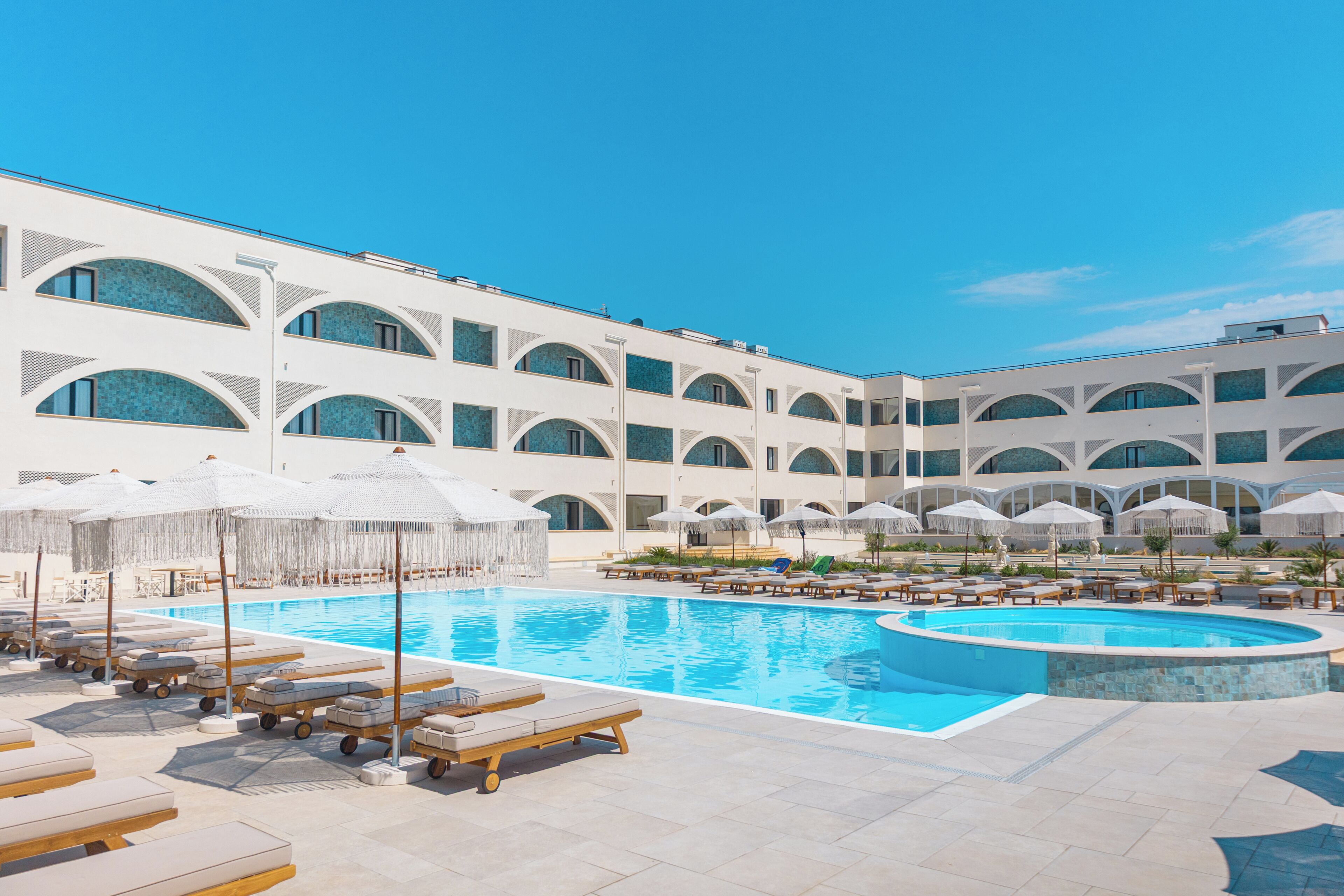 Seasonal outdoor pool, pool umbrellas, sun loungers