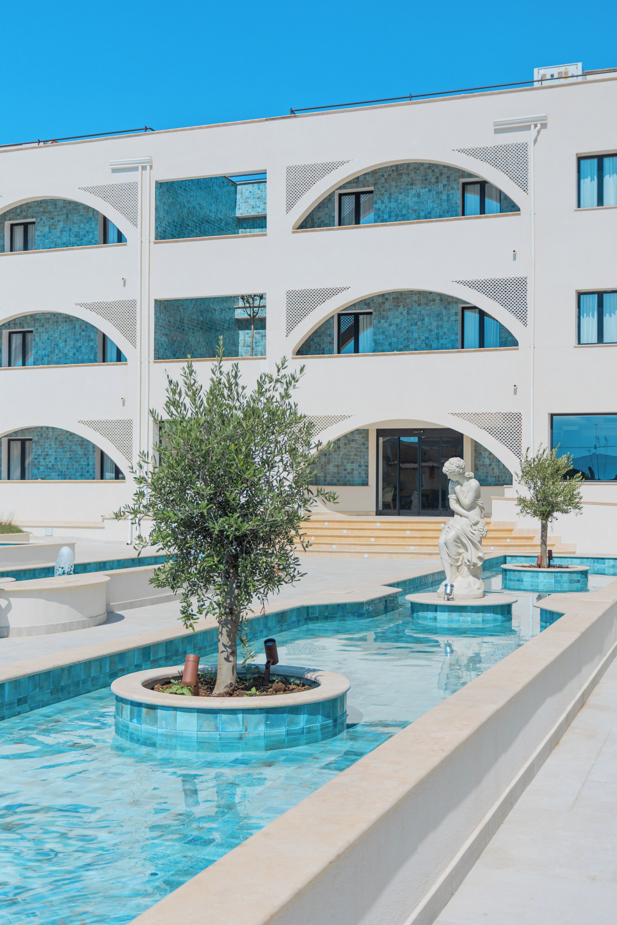 Seasonal outdoor pool, pool umbrellas, pool loungers
