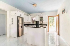 Fridge, microwave, stovetop, cookware/dishes/utensils