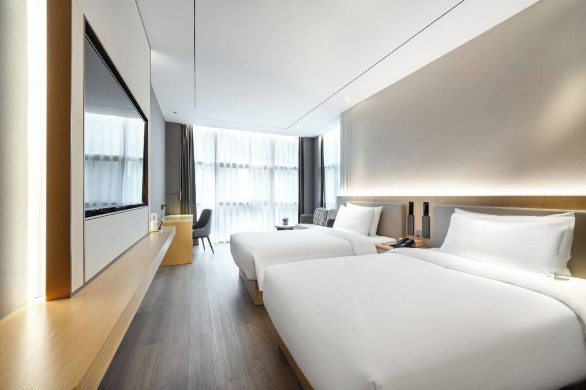 ห้องดีลักซ์ดับเบิลหรือทวิน | เครื่องนอนระดับพรีเมียม, เตียงพร้อมฟูกเสริมที่นอน, Wi-Fi ฟรี