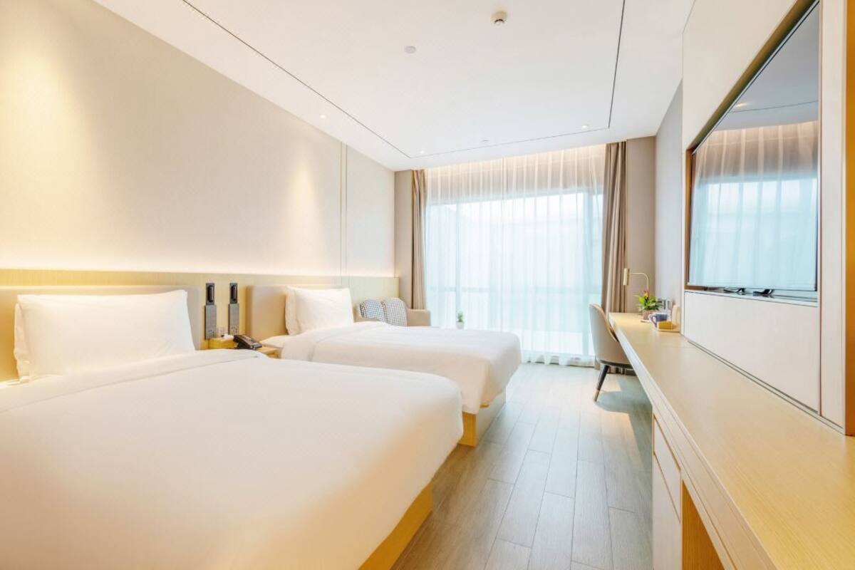 ห้องคอมฟอร์ทดับเบิลหรือทวิน | เครื่องนอนระดับพรีเมียม, เตียงพร้อมฟูกเสริมที่นอน, Wi-Fi ฟรี