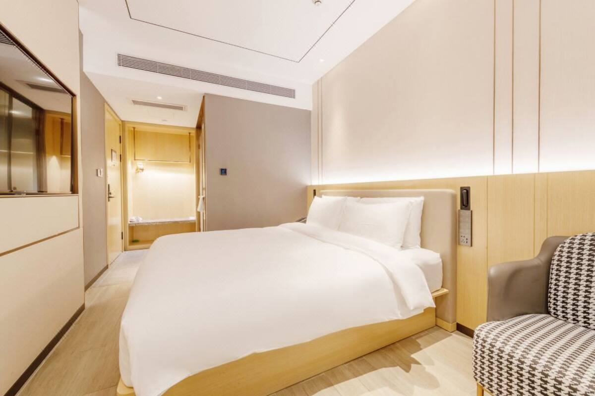 ห้องเบสิกดับเบิล | เครื่องนอนระดับพรีเมียม, เตียงพร้อมฟูกเสริมที่นอน, Wi-Fi ฟรี