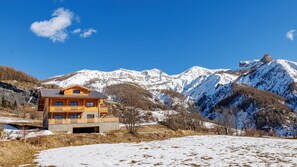 Experience breathtaking views of snow-capped peaks from the lodge's expansive windows and balconies.