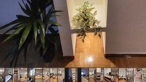 A modern interior with a recessed shelf unit displaying decorative items and a potted plant. - 2 bd Renovated Flat at Acropolis (Athens)