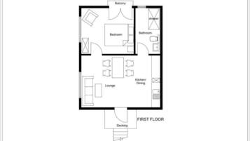 A first-floor floor plan with a balcony, bedroom, bathroom, kitchen/dining, lounge, and deck.
